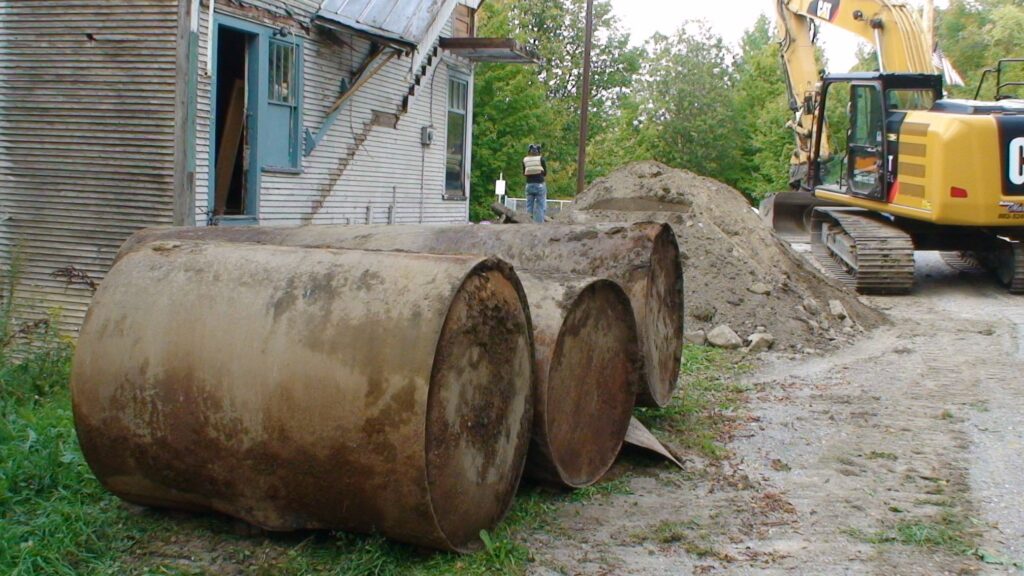 Three Rusted Oil Tanks