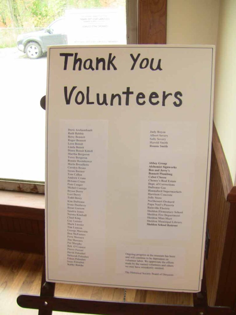 Sign reading thank you volunteers with a list of names